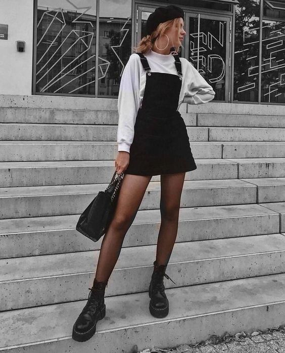 black denim mini skirt jumpsuit and white long sleeve t-shirt