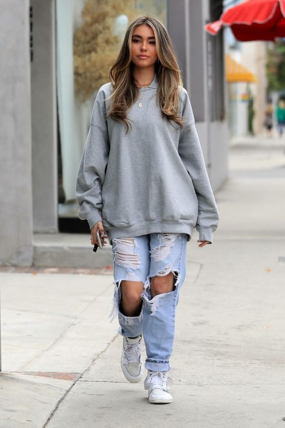 grey oversized hoodie with ripped jeans