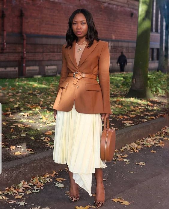 asymmetrical skirts and belted overcoats as vintage work outfits