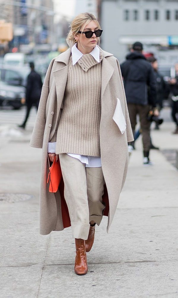 orange bag with monochrome cream outfits for color clashing style