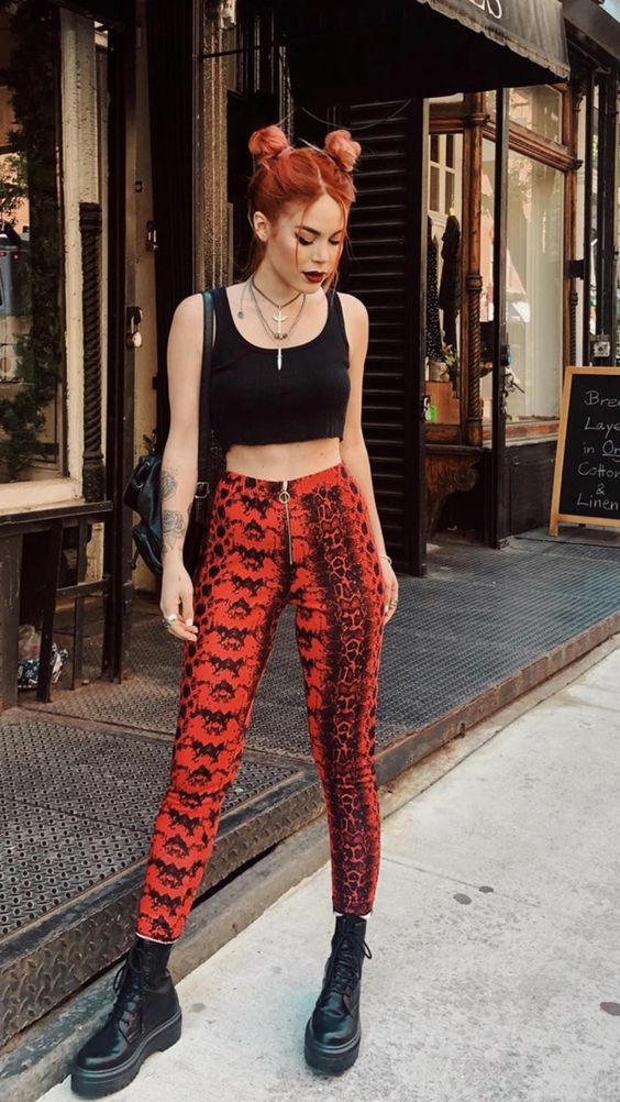snake pattern red skinny pants, cropped tank top, and chunky boots for grunge outfit ideas