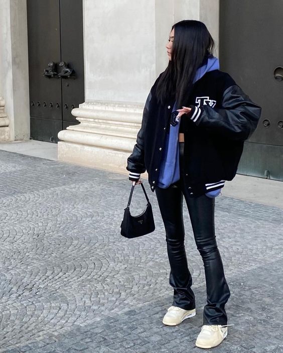 layer your hoodie with an oversized bomber jacket for trendy outfit style