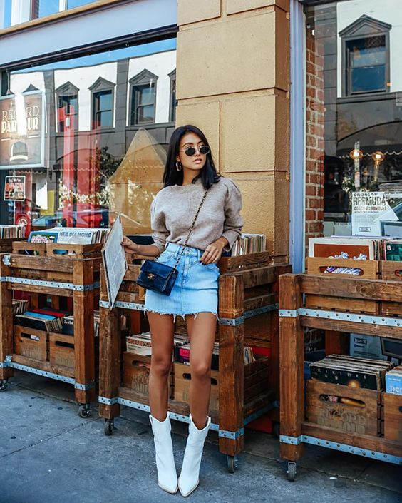 white cowboy boots in denim mini skirt outfit