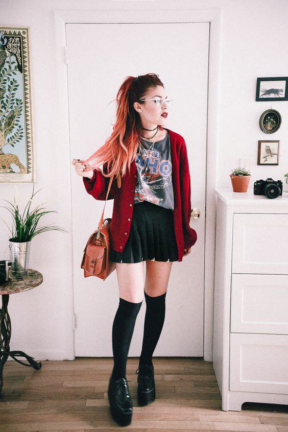 tuck your t-shirt in a black tennis skirt for indie grunge style