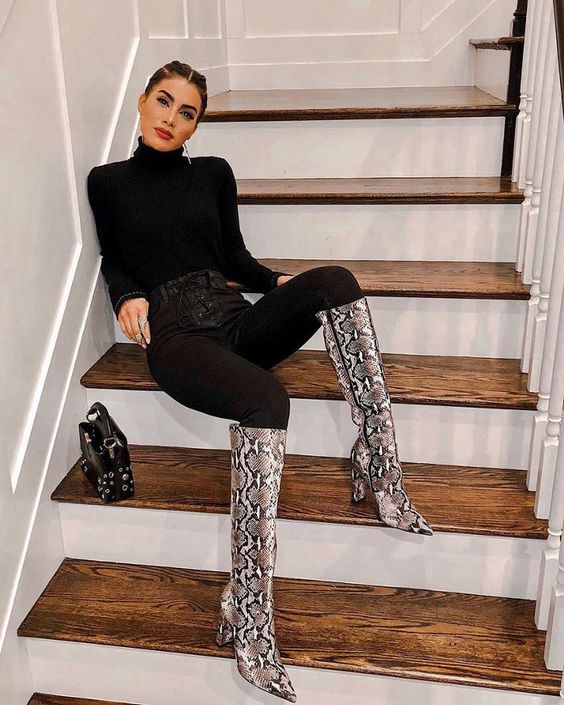 bring a statement with snakeskin knee-high boots in your fancy outfits