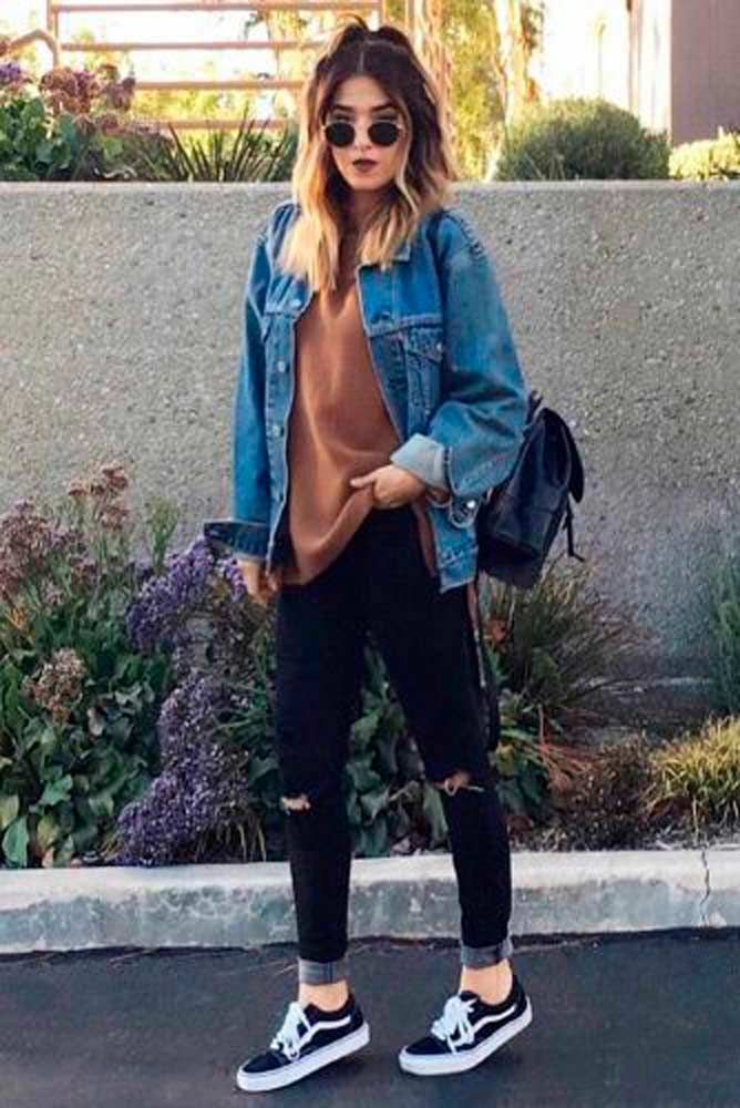 trendy in sneakers and denim jackets