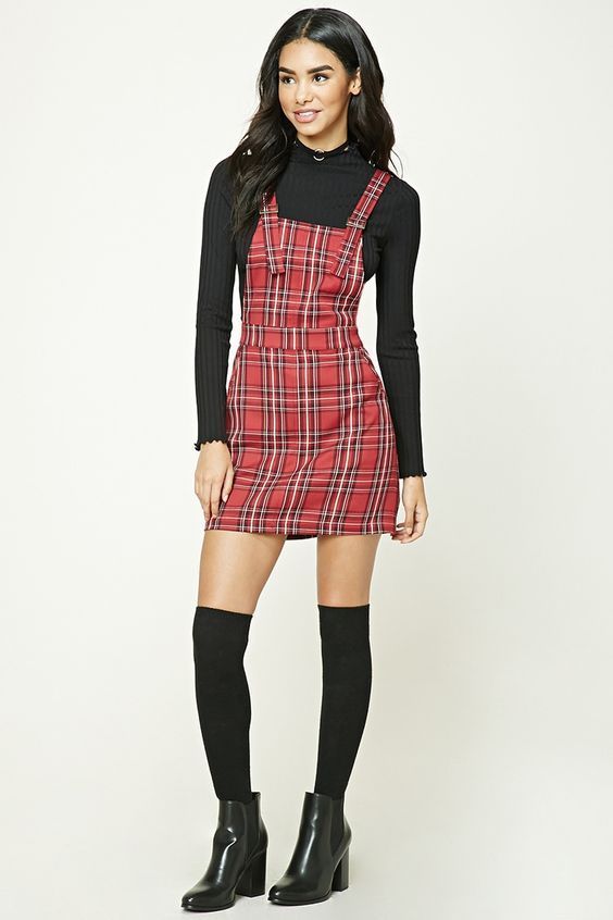 long-sleeve crewneck underneath plaid mini dress