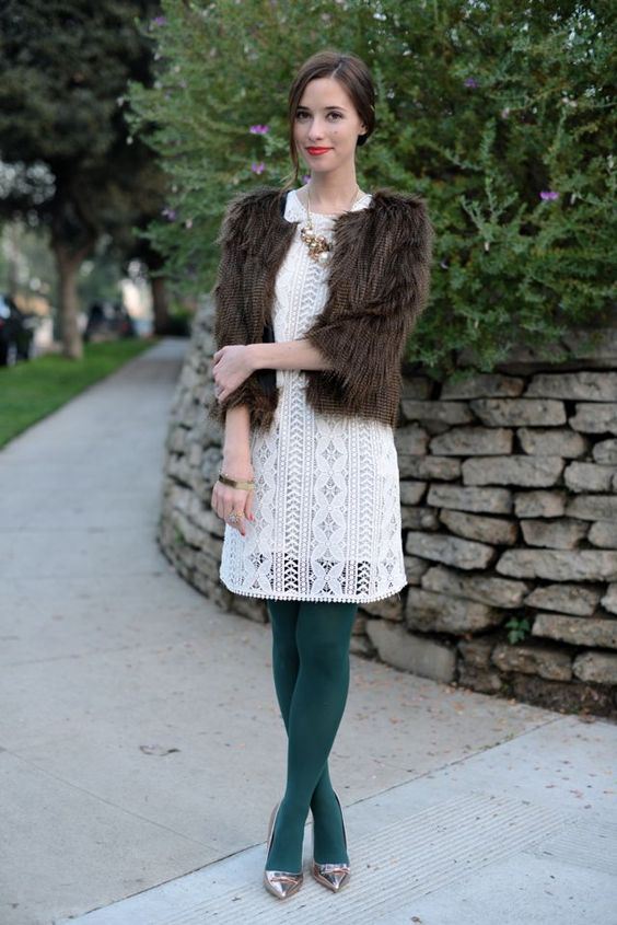 white lace mini dress and brown fur outer