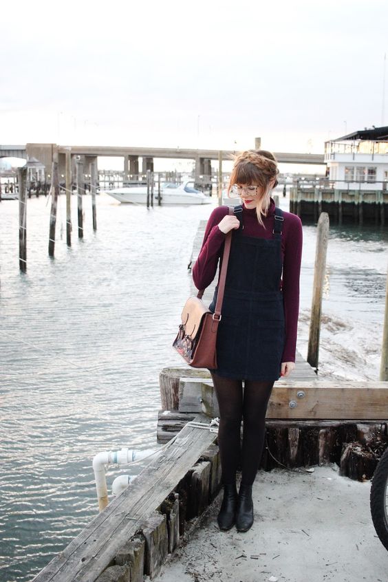 Nerdy girl in mini dress style for winter