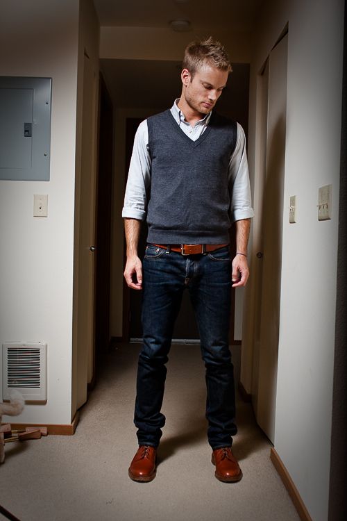 trendy men's outfit style with sweater vest