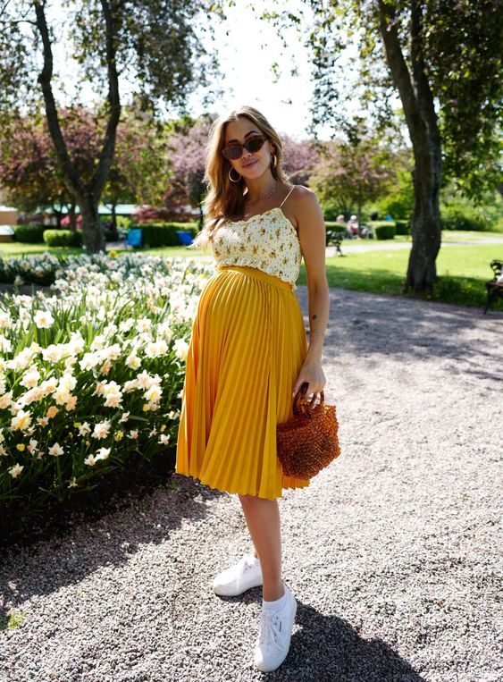 Floral Toppers and Bright Pleated Skirt